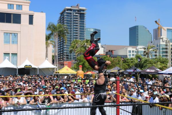 Live Wrestlers perform in front of crowd at San Diego Taco Fest marketing event in California