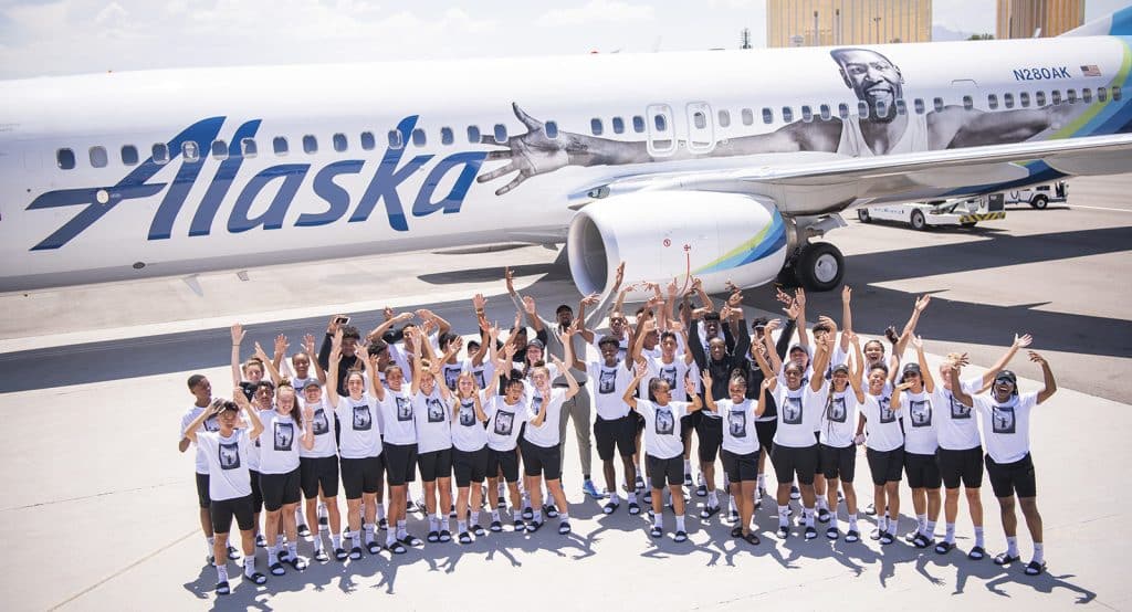 Kevin Durant and fans in front of Alaska Airlines Flight 35 at experiential marketing event in LA