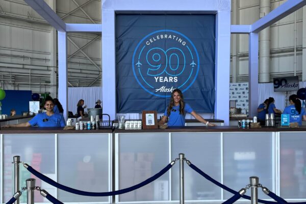 Beverage station with event staffing people for brand event
