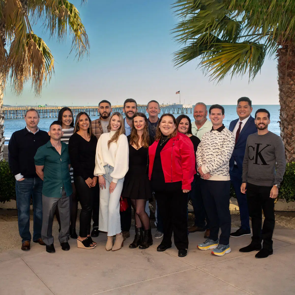 The Southport Marketing team poses together outdoors near the ocean in Los Angeles, showcasing the agency’s leadership and collaborative culture.