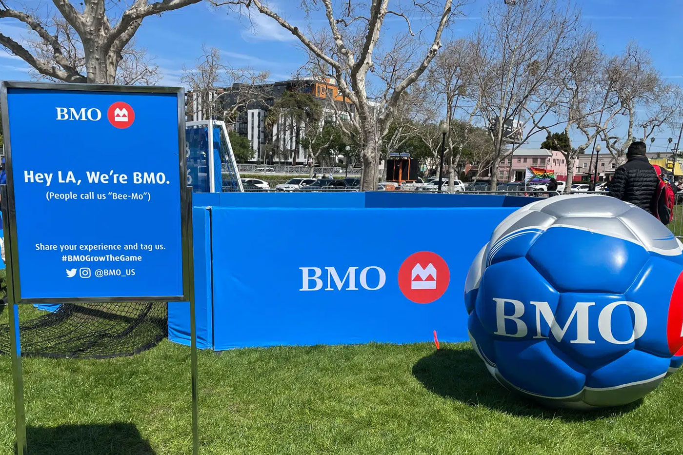 Branded festival environment with interactive fan zones, live entertainment, and sponsor signage for BMO