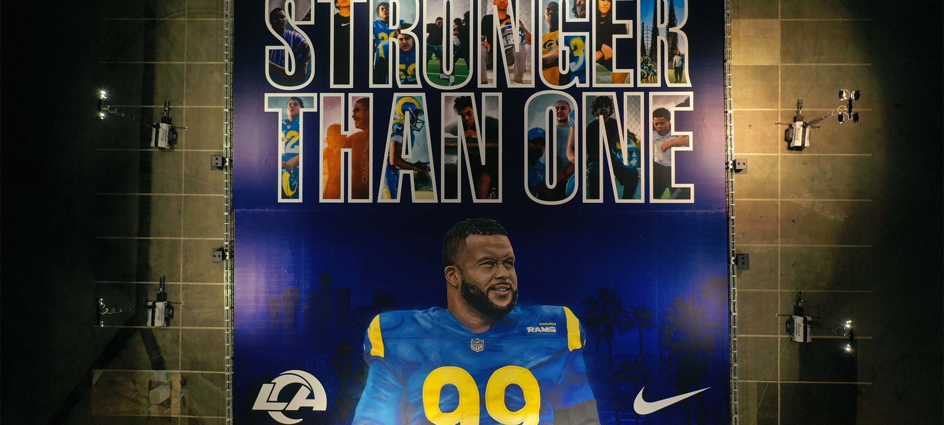 Mural of Aaron Donald reading Stronger Than One